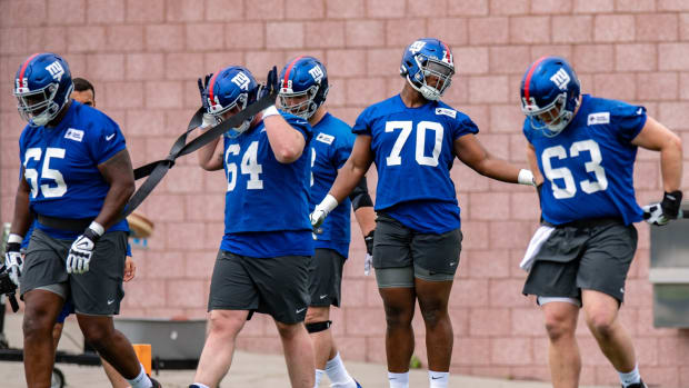 May 2022: Giants offensive linemen go through drills.